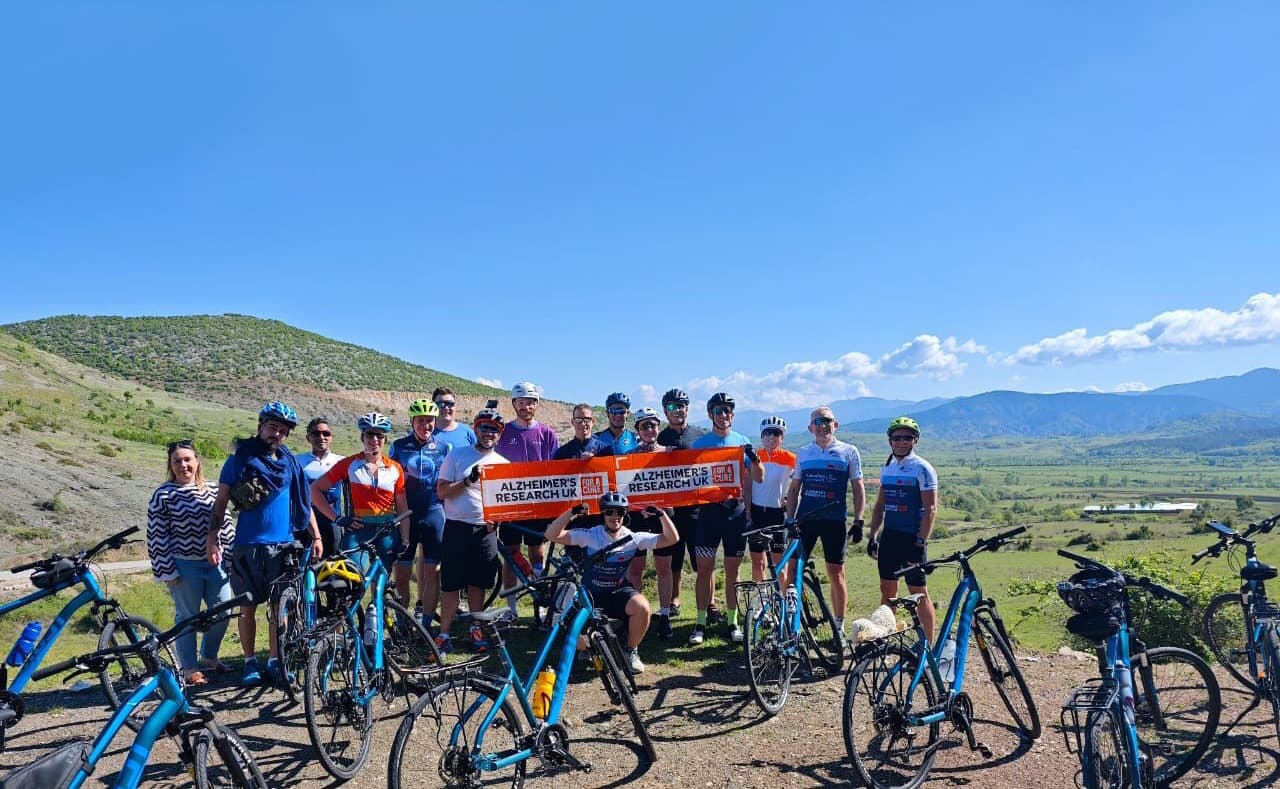 Colleagues who took part in a cycle challenge in Albania with their bikes