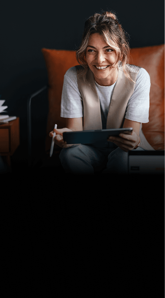 Women sitting with her tablet