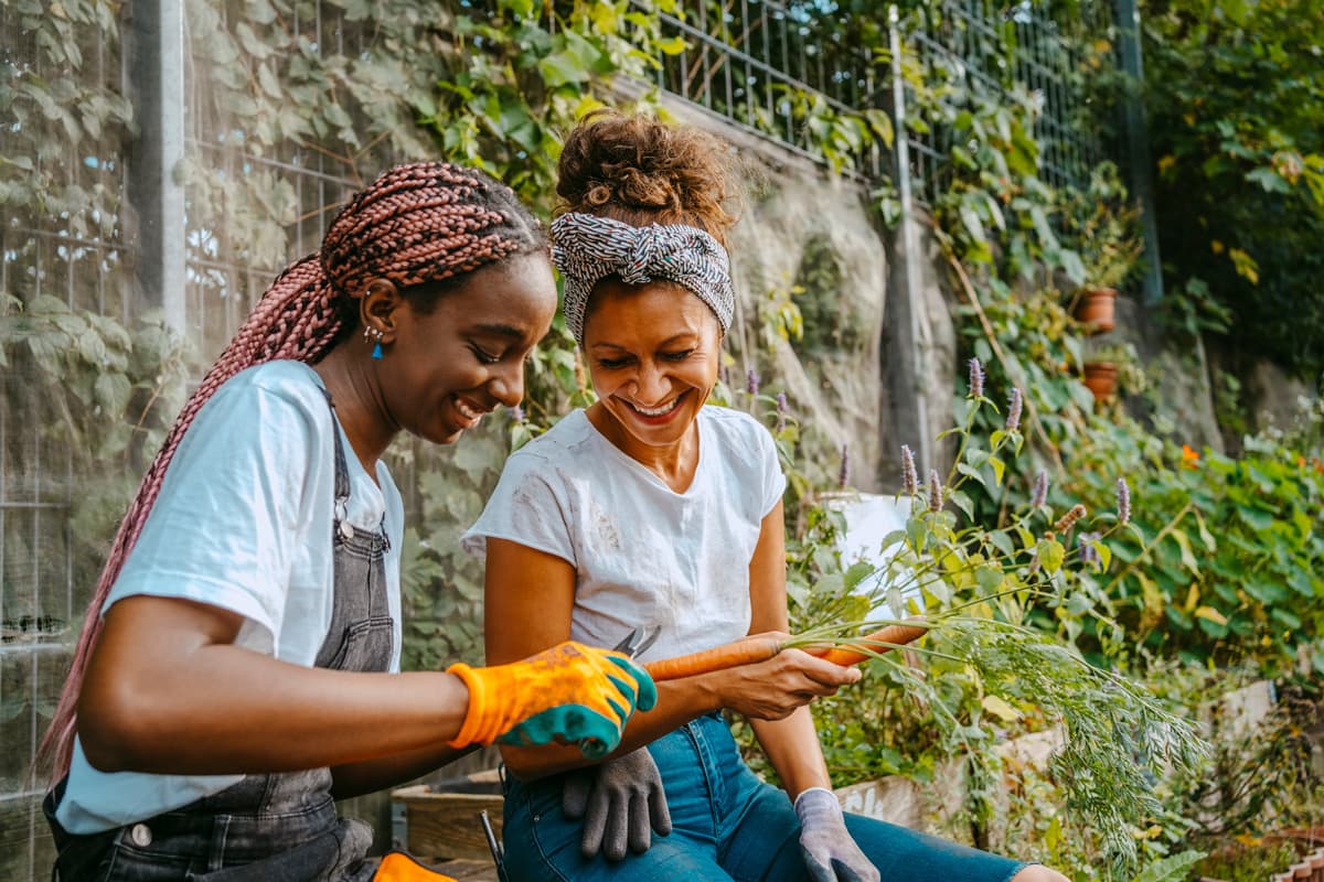 Two young women gardening