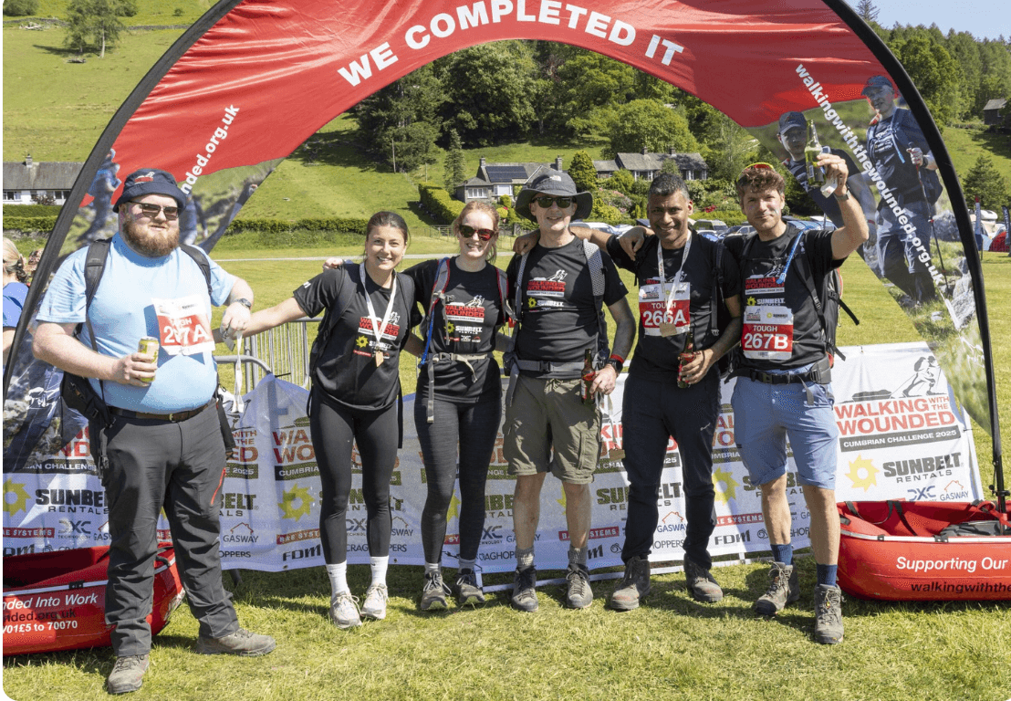 Colleagues at the end of a charity walk