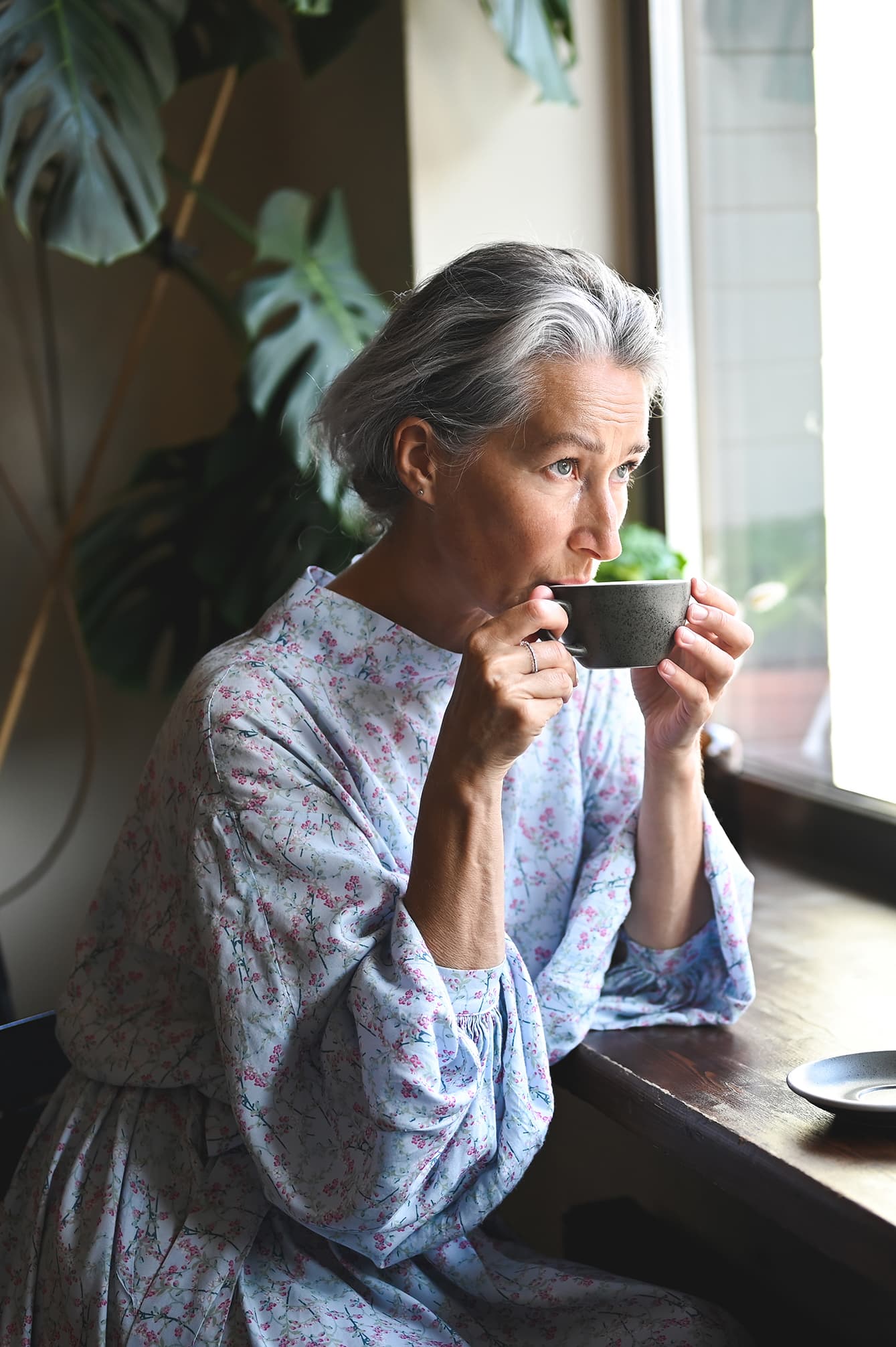 Women drinking hot drink in a cafe
