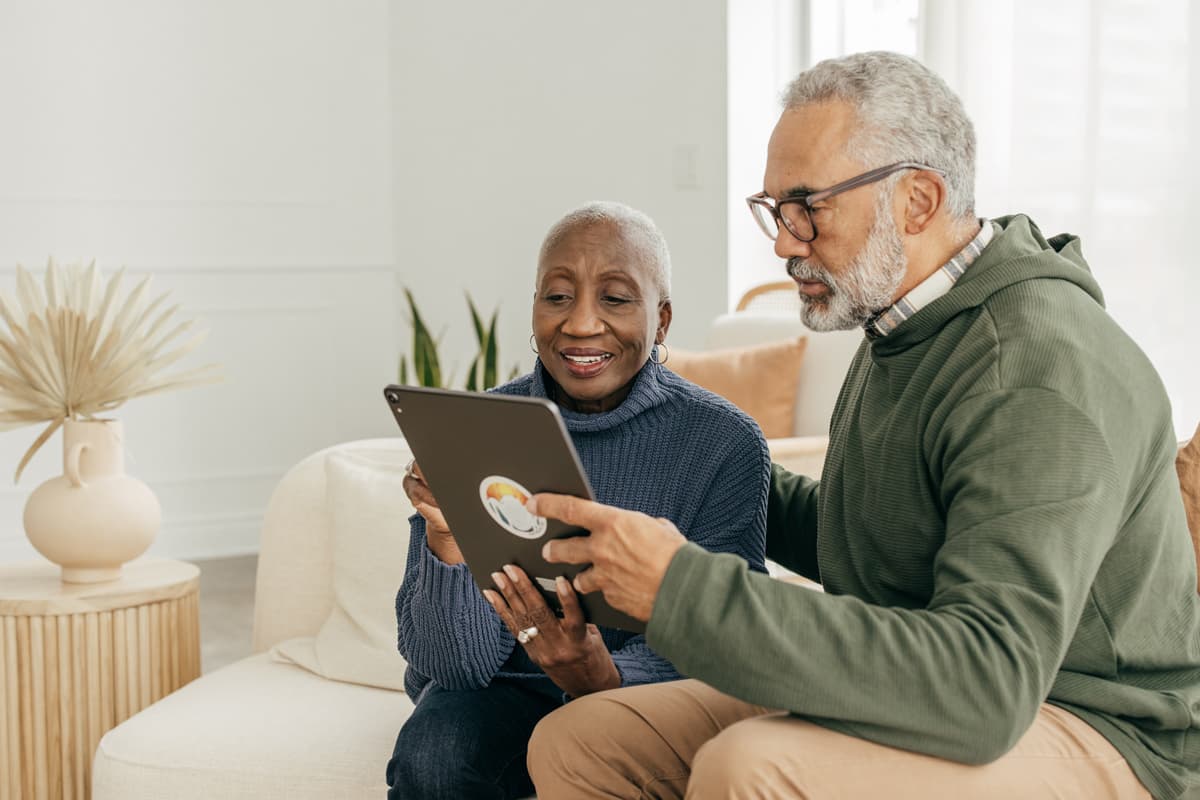 Man and women looking at an tablet